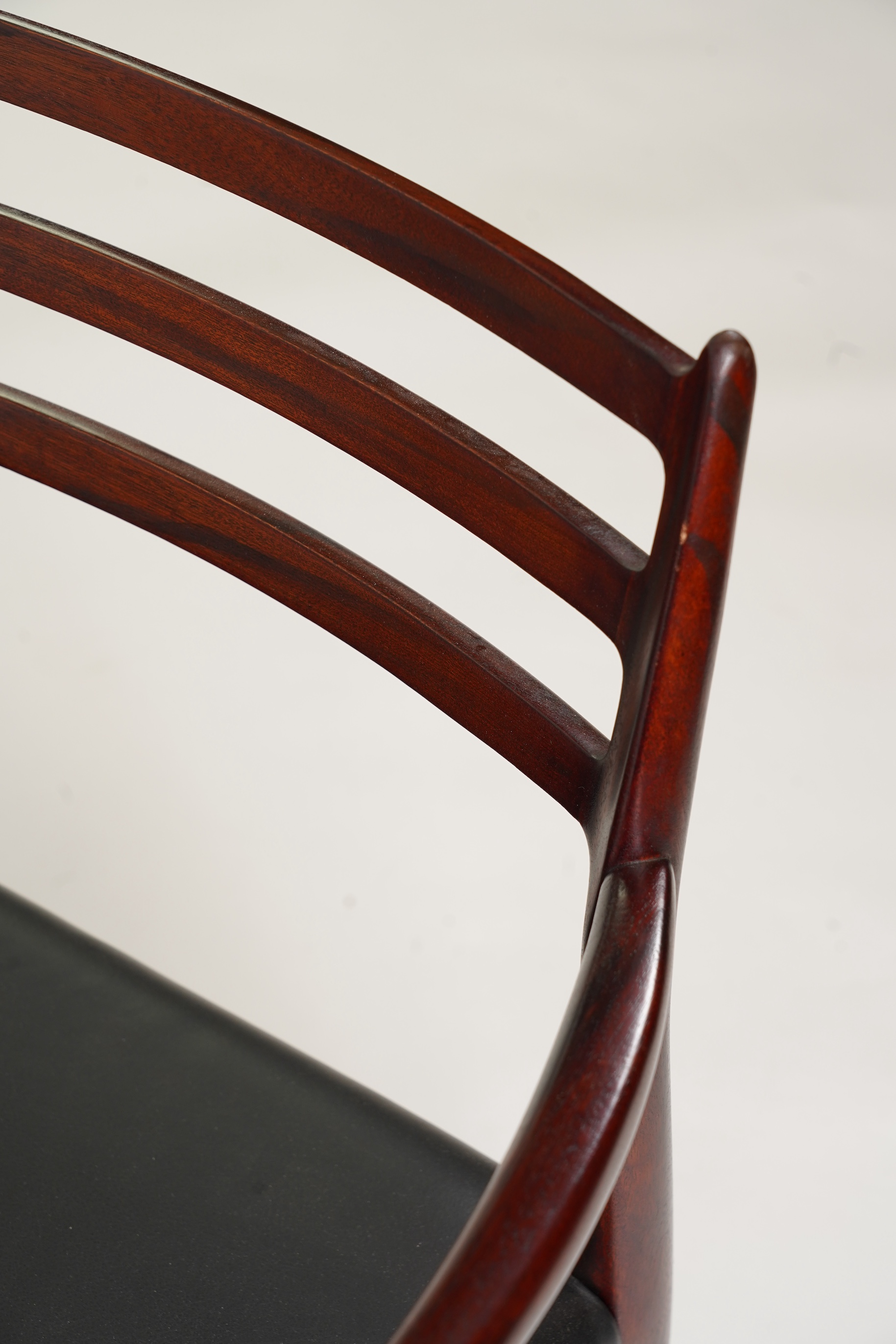 Niels Otto Møller (Danish, 1920-1982) for JL Møllers Møbelfabrik: A pair of 'Model 62' carver chairs